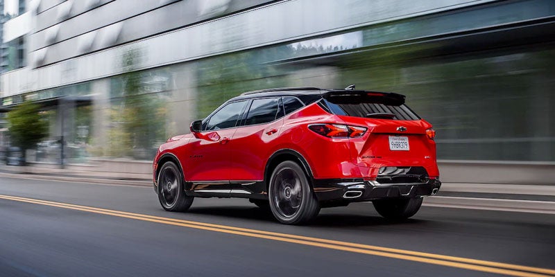 Image of red 2022 Chevrolet Blazer driving on the road