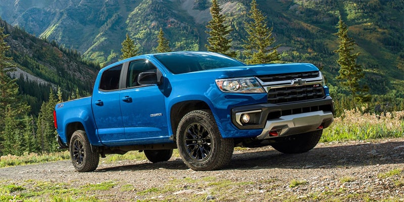 Image of blue 2022 Chevrolet Colorado parked on the mountain top