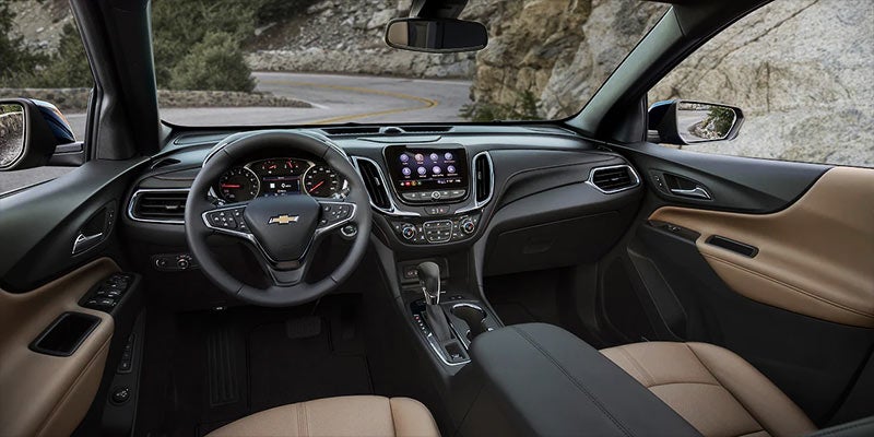 Image of full dashboard view of 202 Chevrolet Equinox on mountain side road