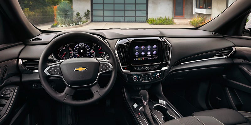 Image of the full interior dashboard view of 2023 Chevrolet Traverse parked infront of a house