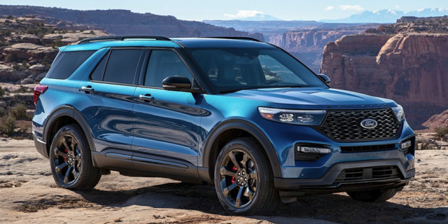 Image of a blue 2022 Ford Explorer parked on the mountain